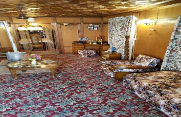 Heritage drawing room with chandelier and hand-knotted carpets